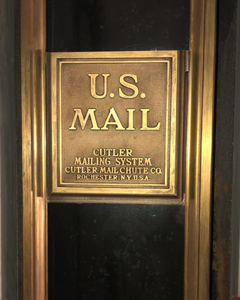 bronze mail chute restored
