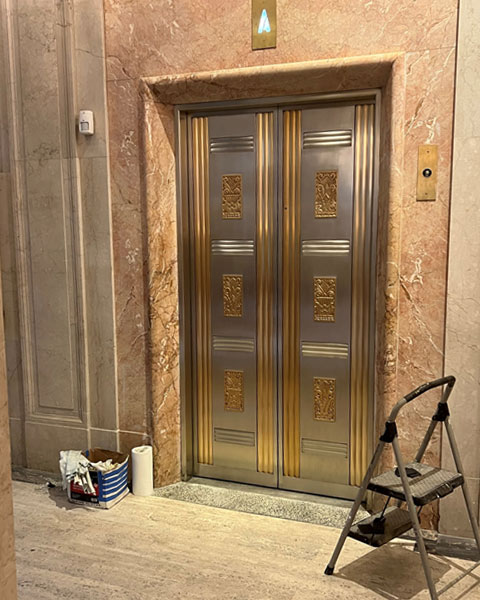 restored bronze elevator doors
