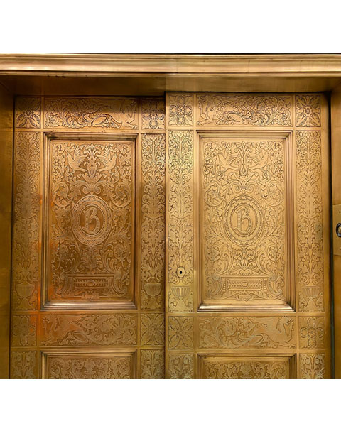 restored bronze elevator doors