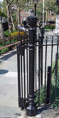 black cast iron newel post located in park